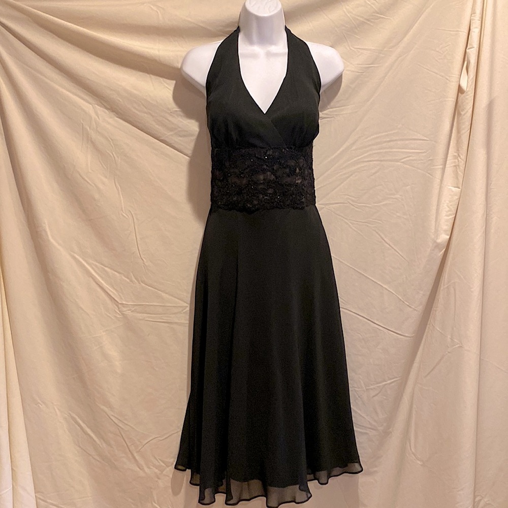 Black halter dress with embellished waist design